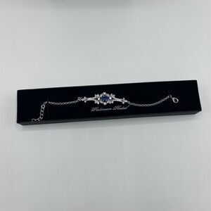 Gold Coast Platinum Plated Bracelet with Blue Stone Adjustable Chain